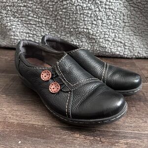 Clarks Black Leather Women's Slip-On Loafers with Wood-like Accent Buttons